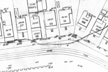 A section of plan no. 771 (above) showing details of houses, tram tracks, an embankment and a contour line.