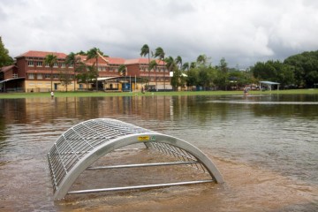 Gregory Park, 28 January 2013. The tide was still rising, and water was gushing into the park through this drain.