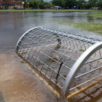 Back from whence they came: as the tide receded, a whirlpool formed in this drain in Gregory Park, 28 January 2013.