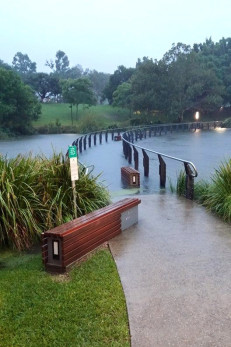 The bridge over the UQ lakes had gone under by 5pm. 