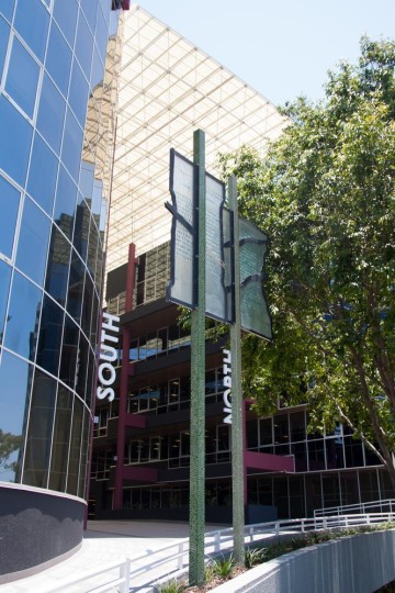 The two 'signposts' at the entrance to the newly renovated John Oxley Centre.