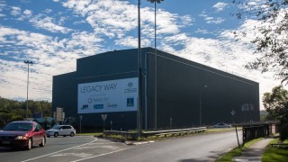 The temporary shed installed to reduce noise and dust from the machines boring the Legacy Way tunnel.