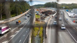 A view of the Legacy Way construction site from the pedestrian overpass.