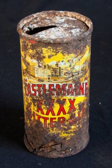 This can is rusted all over, but the colours on the label remain vibrant.